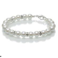 明星戴珍珠手链,明星们的优雅配饰